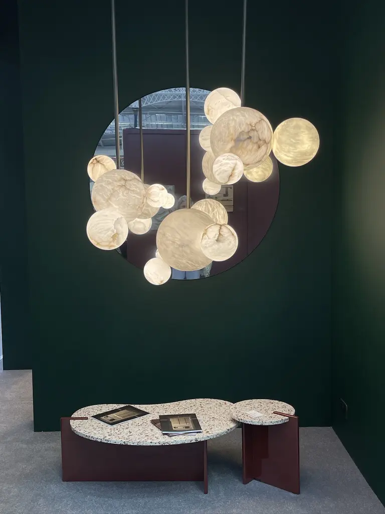 Pendant lights all glowing by United Alabaster Lighting.