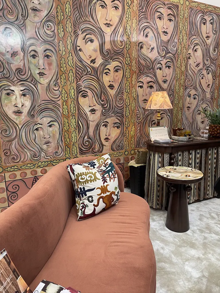 Hyde House Design's Wallpaper and curved sofa