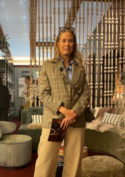 The VIP Lounge at Decorex with Designer Claudia Dorsch standing in front of her room divider