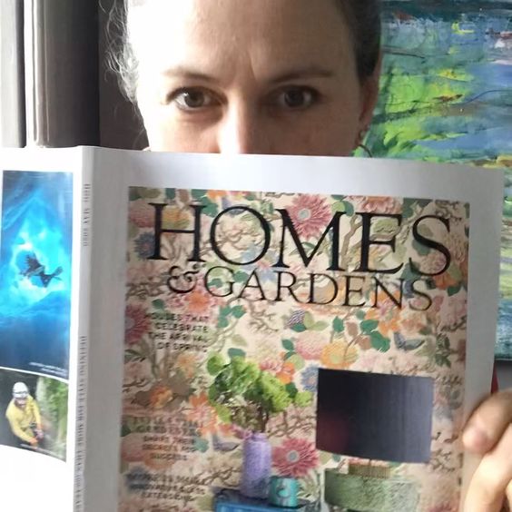 We love interiors magazines! Stylist Emma Morton Turner holding Homes and Garden magazine.