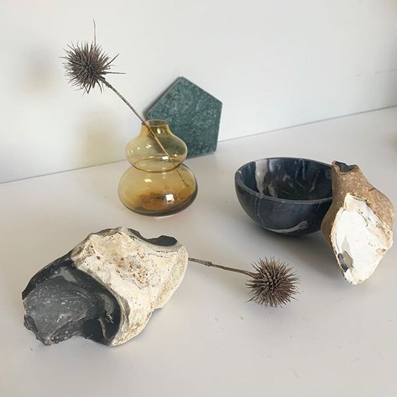 Styling foraged finds from a walk. Thistle heads in a yellow glass vase