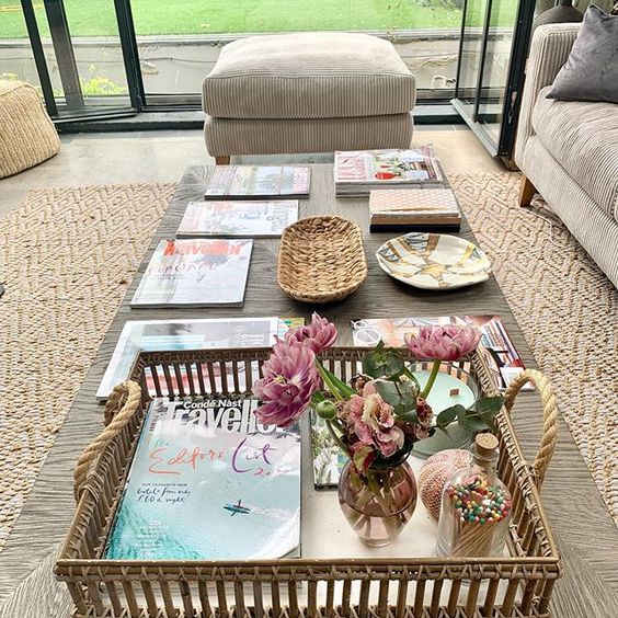 We love interior magazines! Interior lifestyle shot of a living room table with magazines.