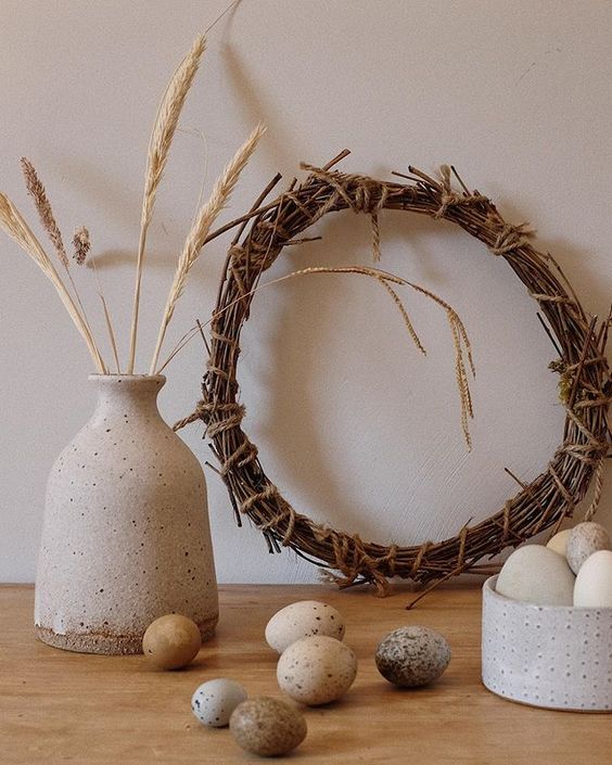 Styling foraged finds from a walk. A collection of eggs and a twig wreath.