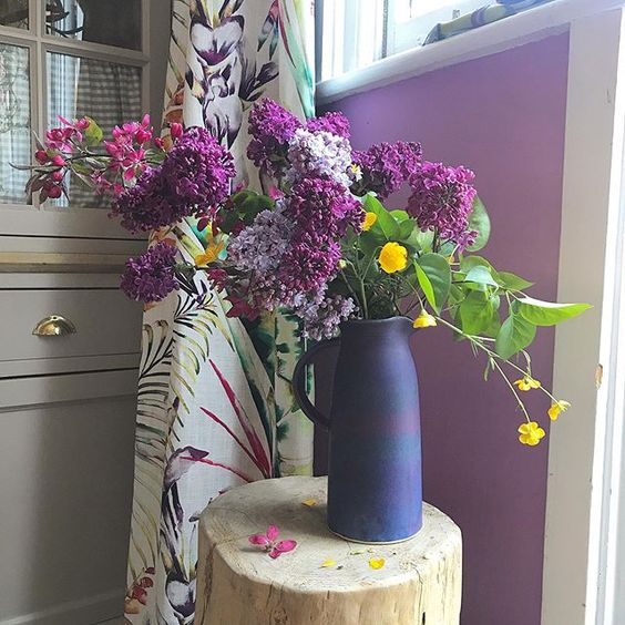 Styling foraged finds, gorgeous purple flowers in a purple vase.