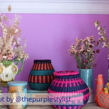 The secret styling tip for adding personality to your home that you need to know! Colourful baskets styled on a shelf in front of a purple wall