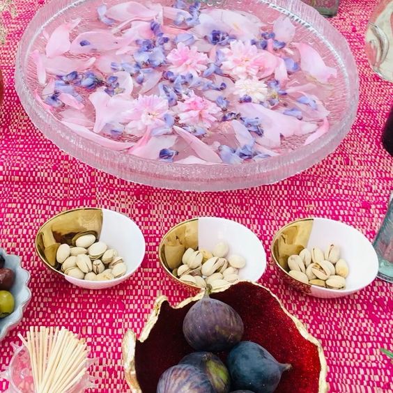 How to use colour in a room. Fabulous colourful food styling on a hot pink tablecloth