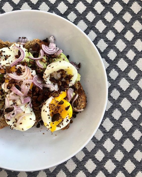 How to use colour in a room. Colourful brunch of eggs on toast styled with seeds