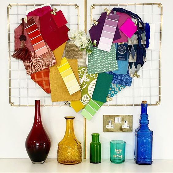 How to use colour in a room. Colourful heart display made from paint swatches and fabric samples