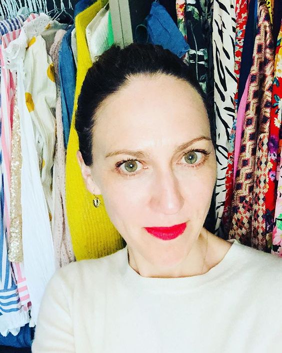 How to use colour in a room. Selfie of a woman wearing bold red lipstick