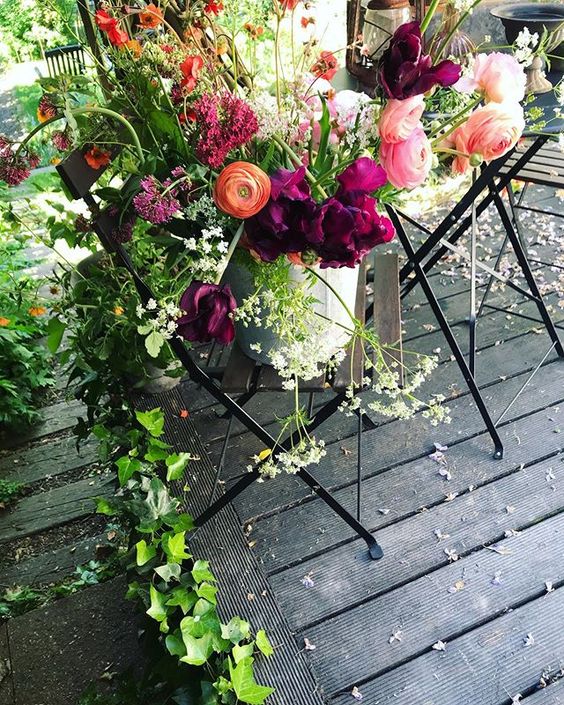 The secret styling tip for adding personality to your home that you need to know! Beautiful flowers styled on an outdoor dining chair