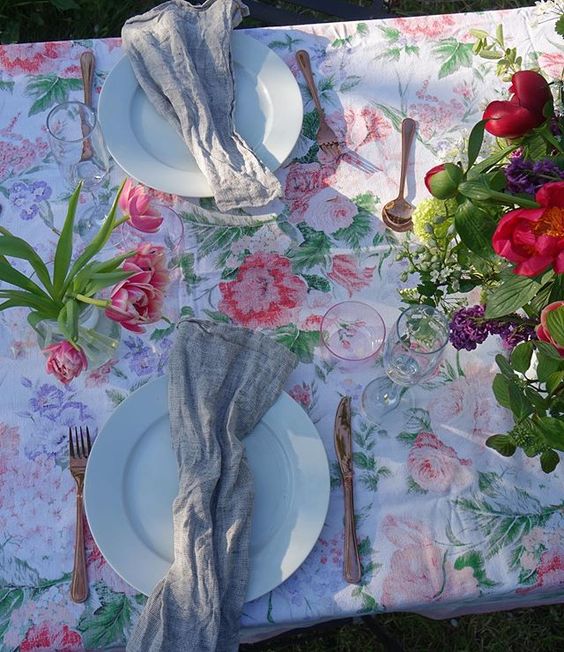 20 of the best vintage interiors in the UK. Vintage flowered tablecloth and cutlery