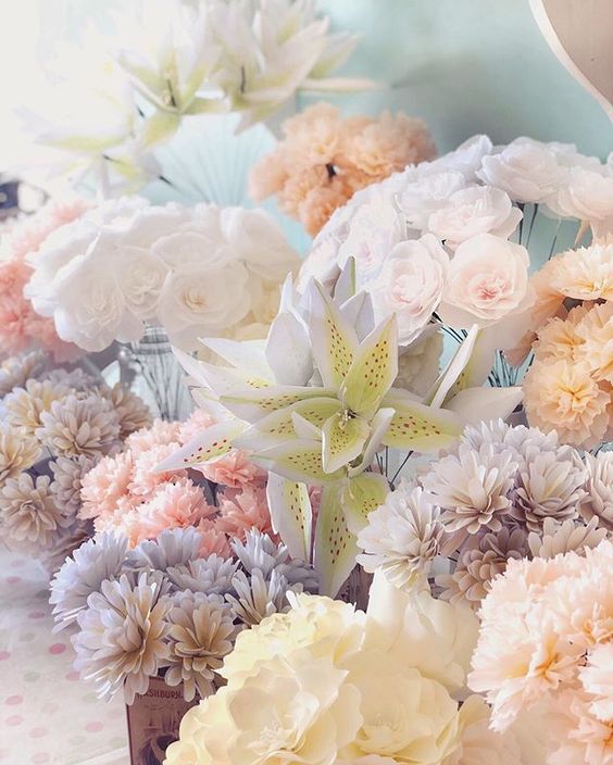 19 creative ways to use paper.Handmade paper flowers for a wedding.