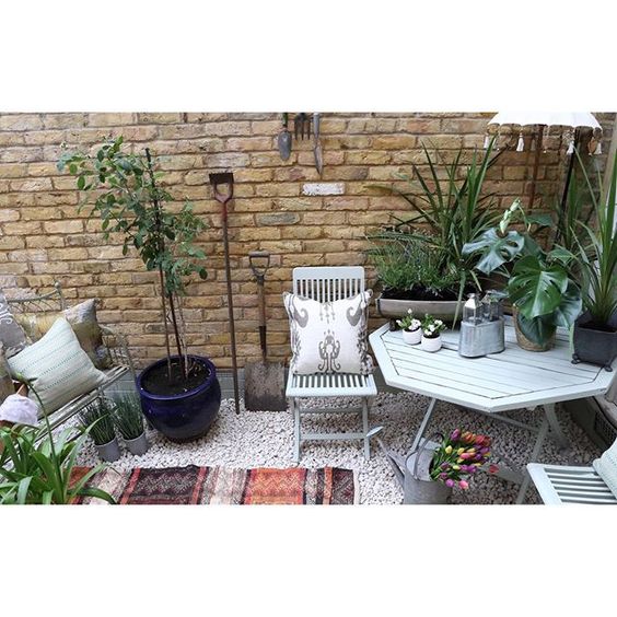 Garden style ideas from UK interior stylists. How to style with plants and outdoor furniture.