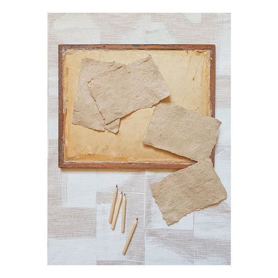 19 creative ways to use paper.Flat lay of assorted paper in muted tones.