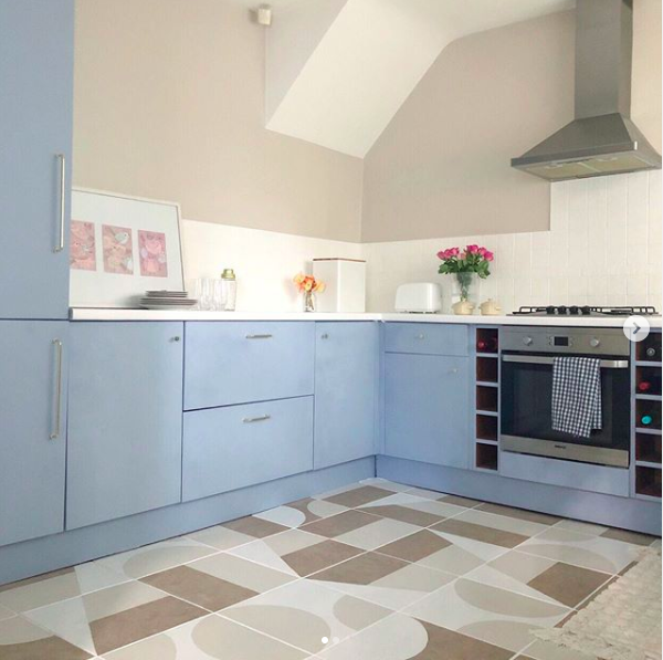 Kitchen with baby blue cupboard doors