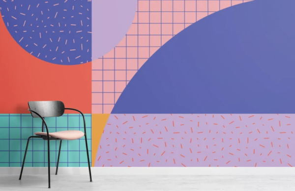 Image of a wallpaper mural featuring a boldly coloured 90s graphic style geometric pattern