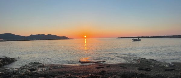 Orange sunrise at Cala Bona in Mallorca while on holiday