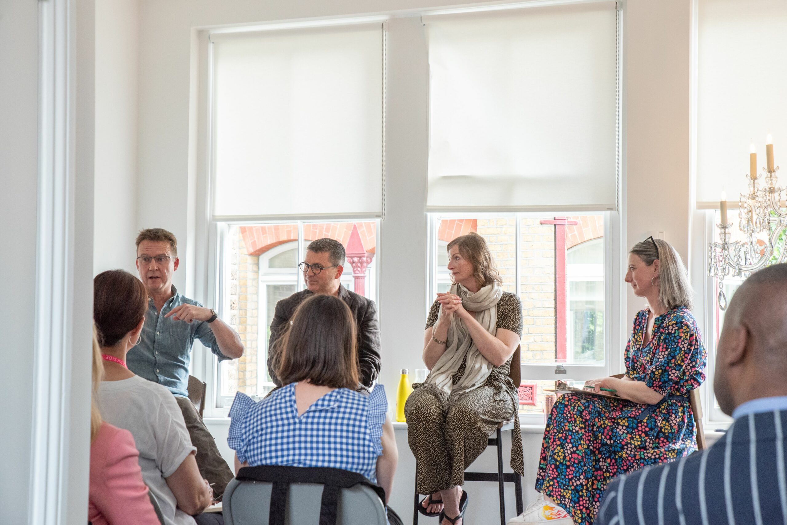 Panel discussion guests at Fritz Fryer lighting shop 