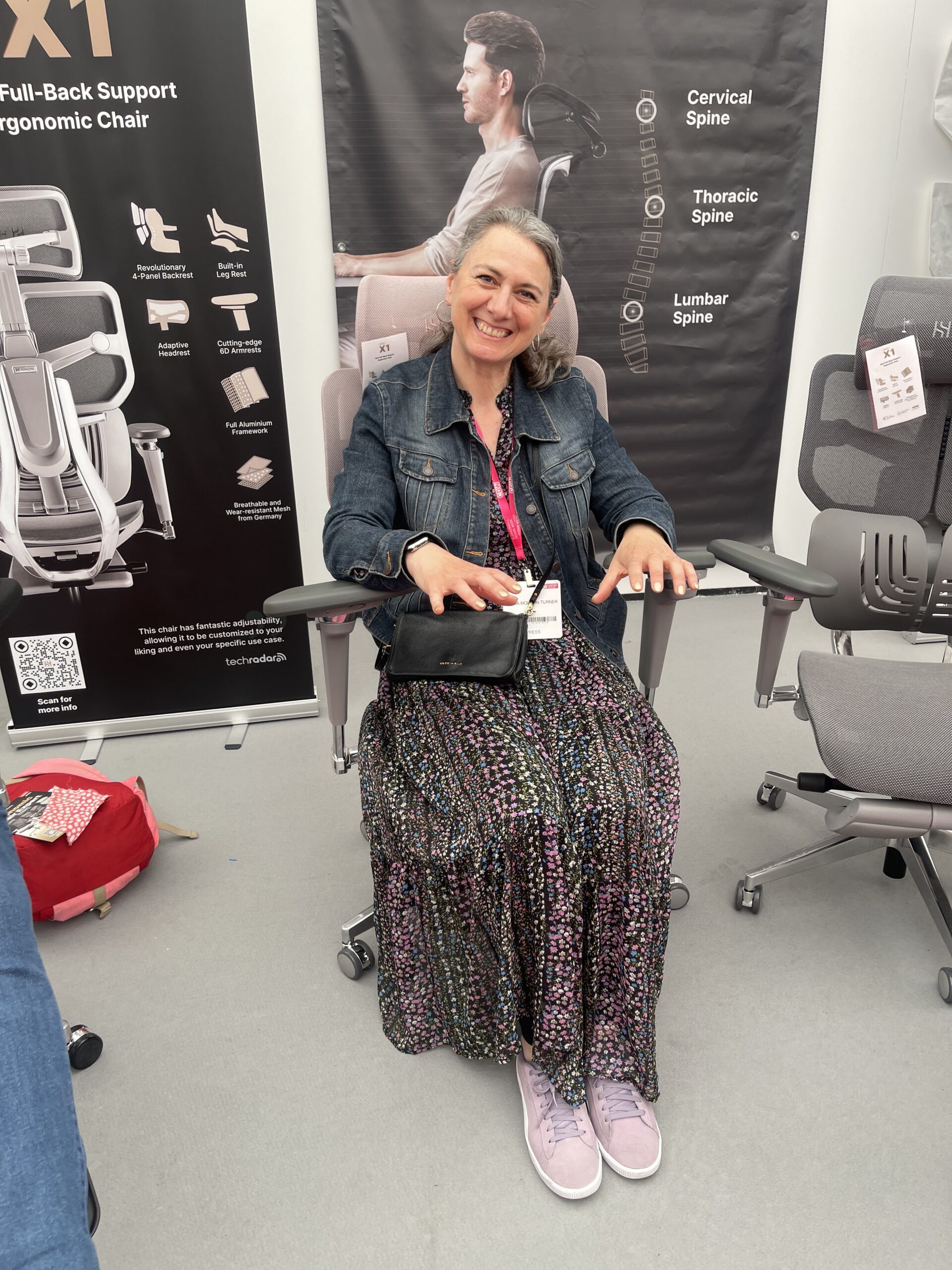 Emma Morton-turner sitting on a Hinomi office chair looking very comfortable