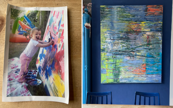 Darcey at 9-12 monhts painting and making a mess