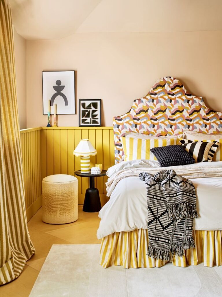 Main Yellow bedroom with patterend headboard