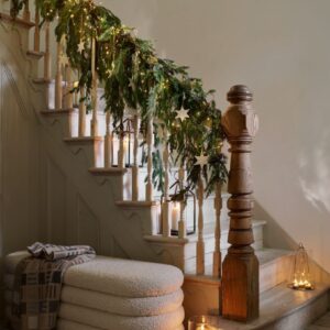 House Beautiful  Christmas Scandi Hallway foliage bannister garland 