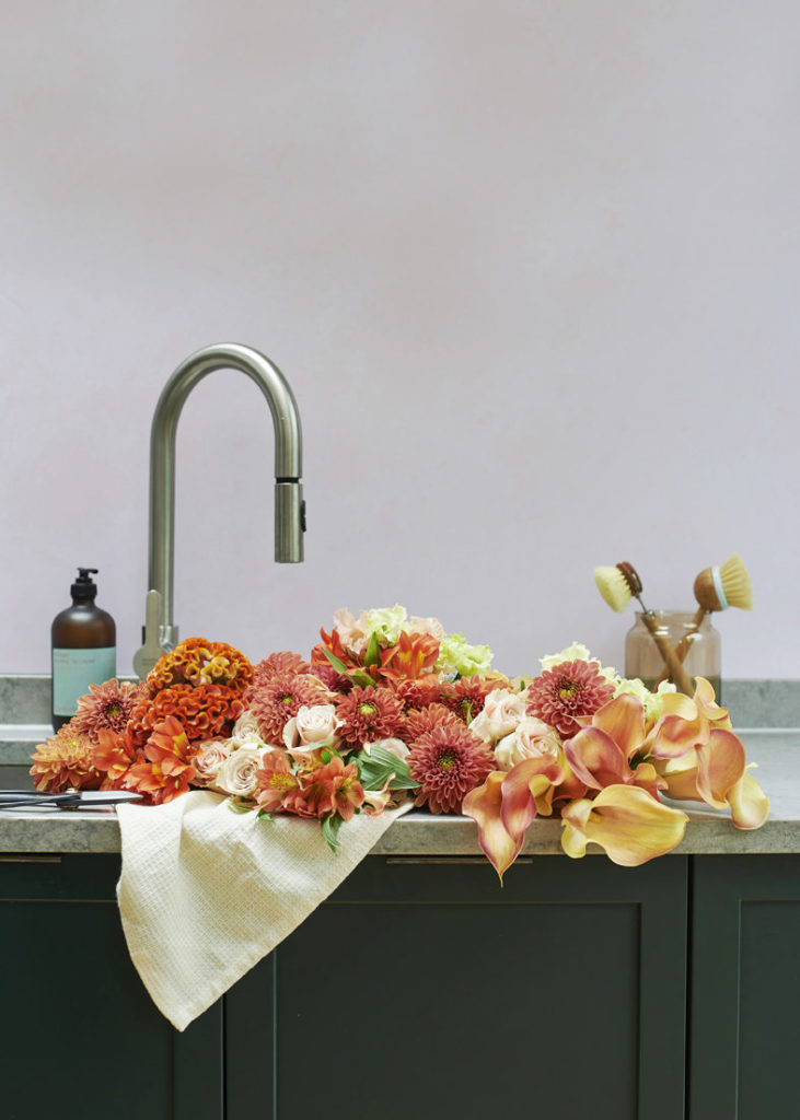 Cut flowers in kitchen sink_Jemma Watts