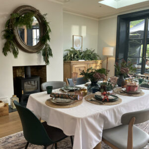 Dining Room set up featuring my foliage on the table, sideboard and mirror 