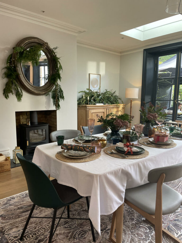 Dining Room set up featuring my foliage on the table, sideboard and mirror